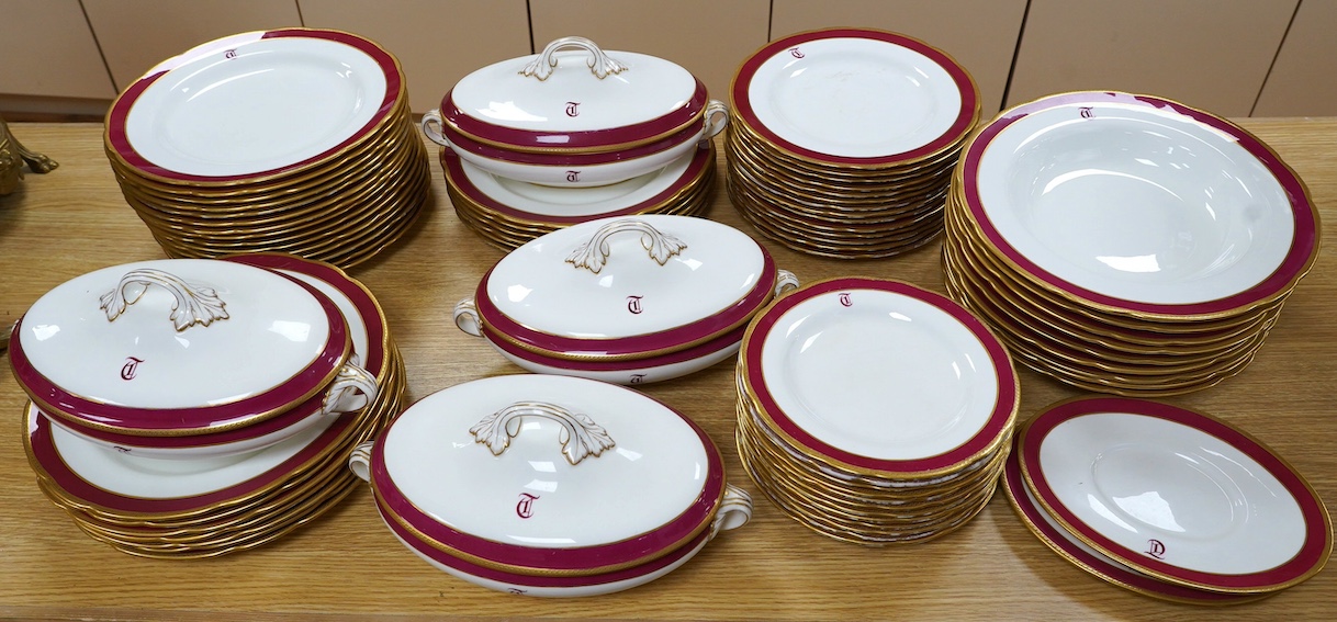 An extensive T. Goode & Co. Wedgwood red and gilt bordered dinner service, monogrammed 